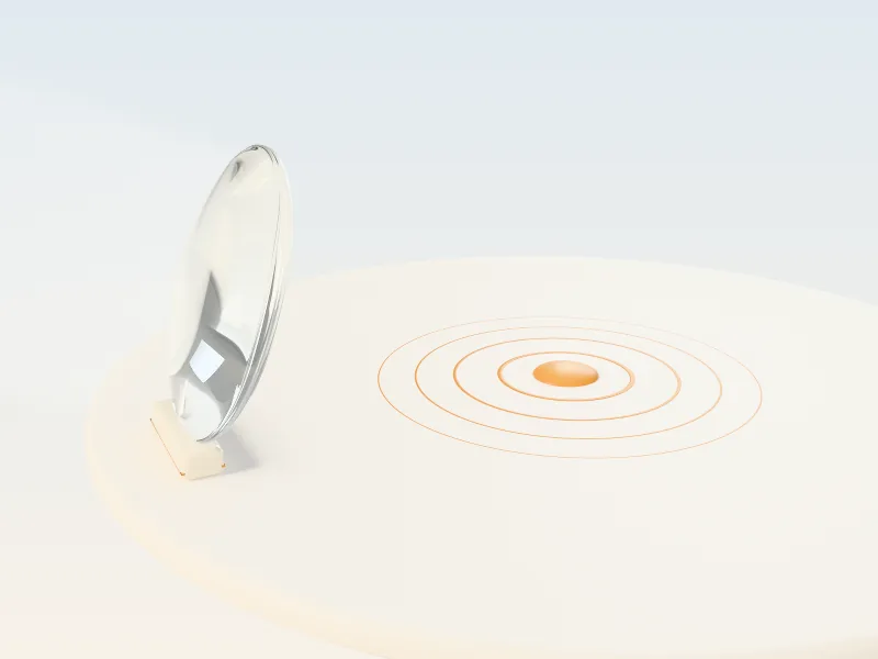 A 3D illustration of a clear glass lens gathering rays of light into one small golden point.